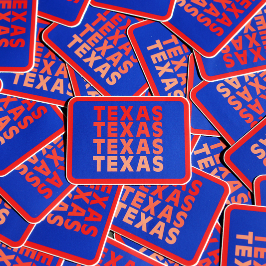 A collection of blue rectangular decals with the word 'Texas' printed in red and white.
