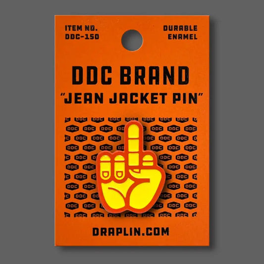 Draplin Design Company yellow and orange middle finger enamel pin on orange backing card
