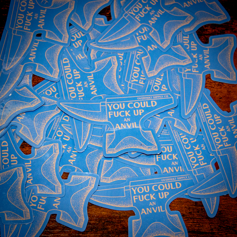 This image features a collection of blue stickers shaped like anvil tools, with a bold, white text that reads "You could fuck an anvil." These stickers are designed in a stylized, three-dimensional shape that mimics the intricate and durable design of an anvil.