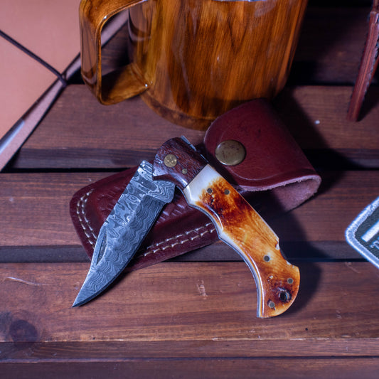 Burnt Bone and Walnut Damascus Folder